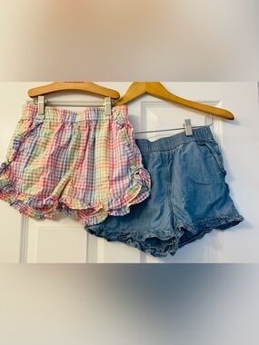 Two pairs of Crewcuts ruffle shorts - size 12 - rainbow and solid denim blue